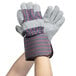 A pair of medium Cordova canvas work gloves with striped cuffs.