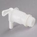 A white plastic Impact vented dispensing container faucet.