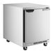A low profile, stainless steel undercounter refrigerator on casters.