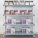 A MetroMax Q shelving unit with boxes and beer bottles on it.