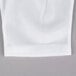 A close up of Cordova Men's Nylon Reversible Inspector's Gloves. White fabric with white cuffs and collar.
