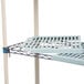 A MetroMax Q shelving unit with metal shelves.