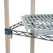 A MetroMax Q shelving unit with metal shelves.