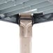 A close up of a metal pole with a screw.