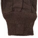 A pair of brown cotton jersey gloves.