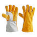 A pair of brown and gray Cordova leather welder's gloves with white foam lining.