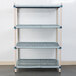 A white MetroMax Q shelving unit with three shelves.