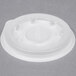 A white plastic lid with a hole for a Dinex mug or bowl.