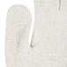 A beige Cordova jersey glove with a curved edge and a loop on it.