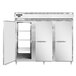 A stainless steel Continental pass-through freezer with two open white doors.