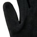 A pair of medium Cordova Commander cut resistant gloves with black foam nitrile coating on the palm.