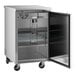 An Avantco stainless steel back bar refrigerator with a door open.