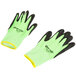 A pair of Cordova Cor-Tex Hi-Vis lime green and black gloves with black and green foam nitrile palms.