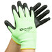A pair of extra large Cordova Hi-Vis Lime gloves with black foam nitrile palms and yellow trim.