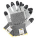 A pair of Cordova Monarch gray work gloves with black dots on the palms.