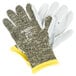 A pair of Cordova Power-Cor Max camo work gloves with yellow tips on a white background.