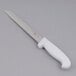 A Choice bread knife with a white handle.