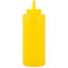 A yellow plastic squeeze bottle with a white lid.