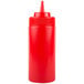A red plastic Choice wide mouth squeeze bottle with a white lid.