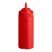 A red 16 oz. wide mouth squeeze bottle with a pointed nozzle lid.