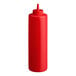 A red 24 oz. plastic squeeze bottle with a pointed nozzle cap.