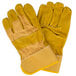 A pair of yellow Cordova canvas and leather work gloves with rubber cuffs.