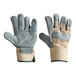 A close-up of Cordova white canvas work gloves with leather palm coating and rubber cuffs on a white background.