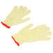 A pair of yellow Cordova work gloves with red trim.