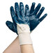 A pair of large blue Cordova nitrile gloves with white interlock lining.