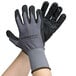 A pair of large gray Cordova warehouse gloves with black foam nitrile and nitrile dots on the palms.