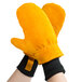 A pair of yellow Cordova Freezer Mittens with black trim and lining.