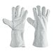 A pair of Cordova gray leather welder's gloves with white stitching.