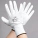 A pair of Cordova white gloves with black text that reads "CWC"