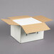 A white box with a white lid.