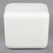 A white foam cube with a lid on it.