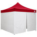A white and red tent with a red top.