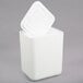 A white styrofoam container with a square lid