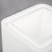 A white foam container with a lid.
