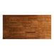 A rectangular solid wood table top with a rustic walnut finish and live edge design.