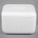 A white styrofoam box with a lid.