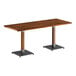 A Lancaster Table & Seating live edge table with metal legs and a wooden top.