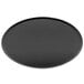 A black round Matfer Bourgeat oven sheet/pizza pan.