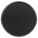 A black round Matfer Bourgeat carbon steel pizza pan.