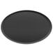 A black round Matfer Bourgeat carbon steel pizza pan.