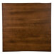 A brown square wooden table surface.