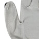 A close up of a Cordova OGRE-CR glove with a gray and black design.