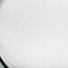 A close up of a Matfer Bourgeat fine mesh sieve.