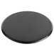 A black round Matfer Bourgeat carbon steel pizza pan.