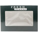 A black bakery box with a clear plastic window and the word "Fresh" in white.