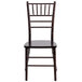 A Flash Furniture walnut chiavari stacking chair.